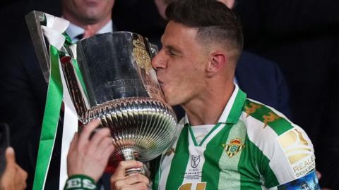 Joaquin celebrates with the Copa del Rey trophy