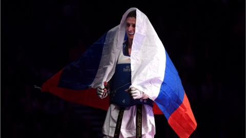 Vladislav Larin celebrating his gold medal at the 2019 World Taekwondo Championships