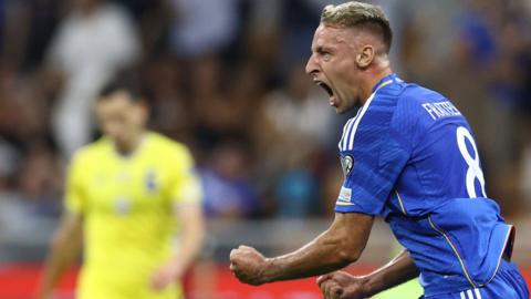 Davide Frattesi celebrates scoring for Italy