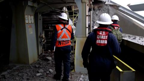 Investigators on board ship