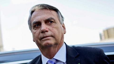 Former Brazilian President Jair Bolsonaro leaves the Federal Police headquarters after testifying about the January 8 riots, in Brasilia, Brazil, October 18, 2023.