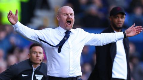 Sean Dyche looks on during a game