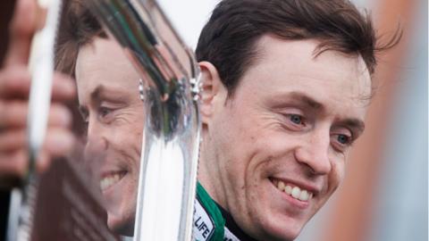 JJ Slevin celebrates winning the Irish Grand National on Intense Raffles