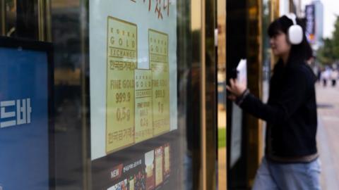 An advertisment for gold bars at the Korea Gold Exchange store in Seoul, South Korea, on Friday, Oct. 13, 2023.