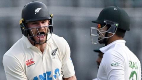 New Zealand's Glenn Phillips celebrates after guiding his side to a four-wicket win over Bangladesh in the second Test in Mirpur