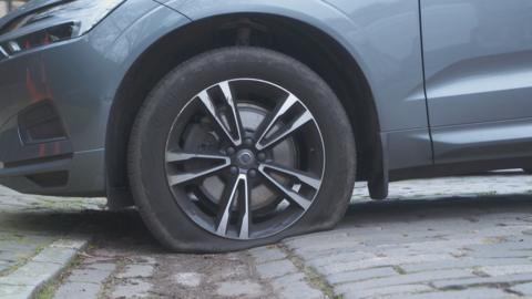 A tyre deflated on a SUV in Edinburgh