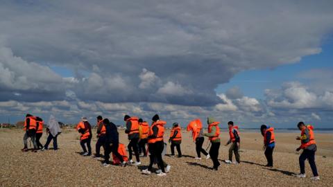 Migrants arriving at Dungeness Beach