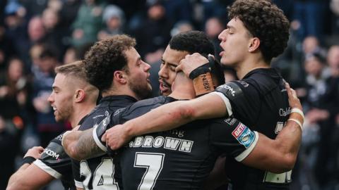Hull FC celebrate their first win of the season