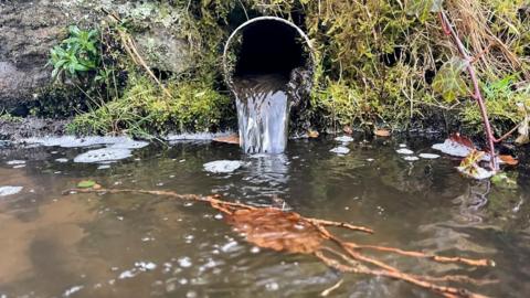 Discharge into a river