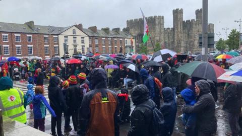 Protestors gather near Caernarfon Castle