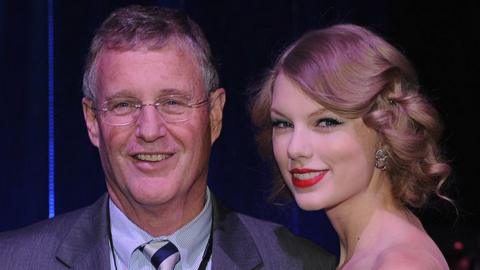 Taylor Swift with her father Scott in 2011