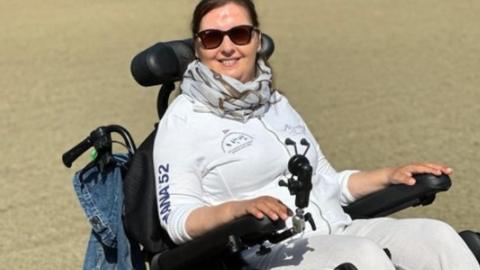 Didi Diaris in her wheelchair