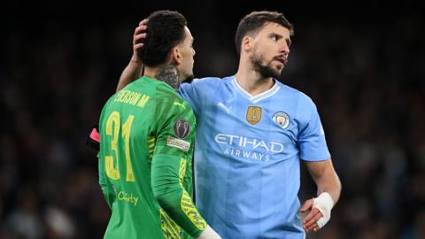 Manchester City's Ederson and Ruben Dias