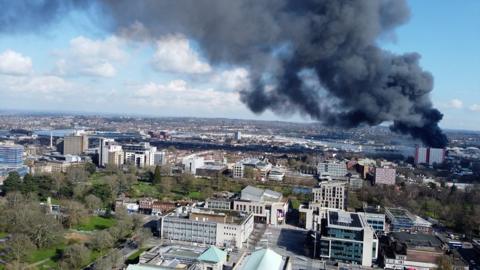 Plume of smoke across Southampton city skyline