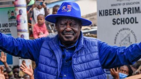Kenyan opposition leader and candidate Raila Odinga waves to supporters after casting his vote in the Presidential elections on August 9, 2022 in Nairobi, Kenya