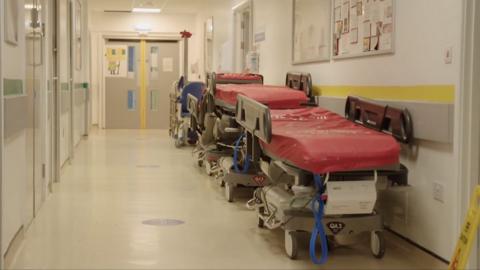 hospital beds in a corridor