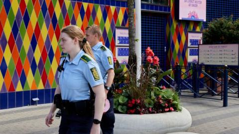 Police outside the Tivoli Friheden amusement park in Aarhus, Denmark