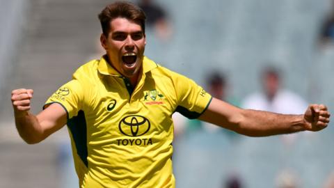 Australia's Xavier Bartlett celebrates taking a wicket against West Indies in the first ODI