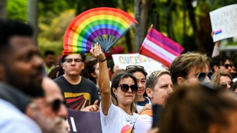 A supporter of LGBTQ rights participates in a rally in Florida in 2022, to oppose the Parental Rights in Education Act