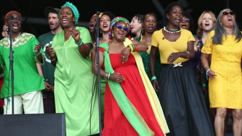 The Bristol Reggae Orchestra and the Windrush Choir perform on the Pyramid Stage