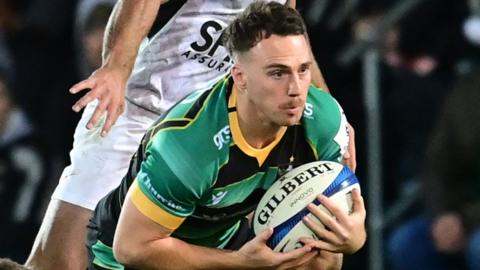 Tom James playing for Northampton Saints