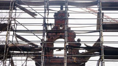 The historic Boersen Stock Exchange one day after a fire ravaged the building and its iconic spire in Copenhagen on April 17, 2024.