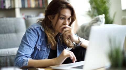 Stock shot of woman at computer