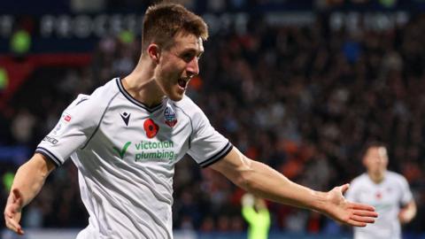Bolton's George Thomason celebrates his goal against Blackpool