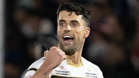 Gloucester fly-half Adam Hastings celebrates