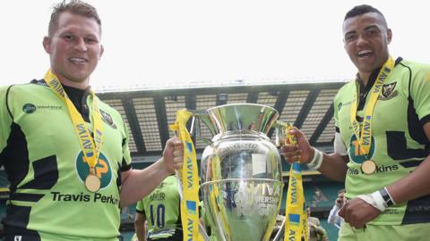 Dylan Hartley and Luther Burrell hold the Premiership trophy following Northampton's win in 2014