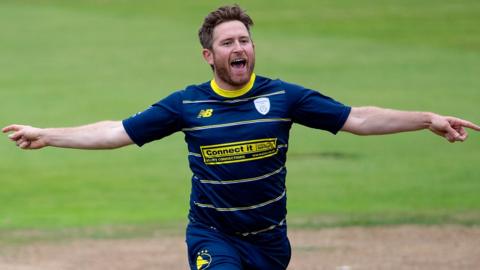 Liam Dawson celebrates the second of his seven wickets for Hampshire