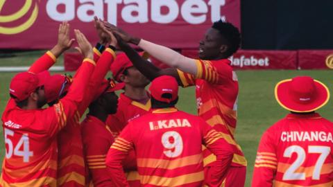 Zimbabwe's cricketers celebrate a wicket
