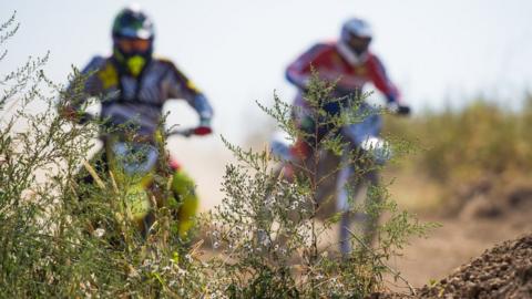 Blurry image of motorcycles during the motocross race