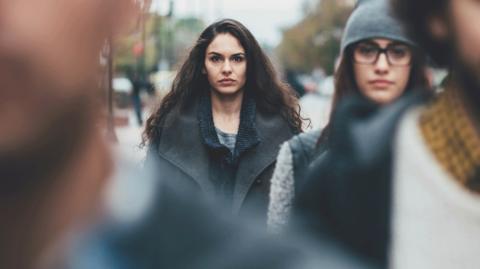 Woman in crowd