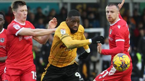 Omar Bogle of Newport County looks to shoot at goal