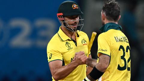 Marcus Stoinis and Glenn Maxwell celebrate Australia beating Sri Lanka at the Cricket World Cup