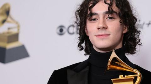 Blair Ferguson poses in the press room during the 66th annual Grammy Awards