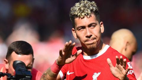 Roberto Firmino gestures to Liverpool fans after his final home game at Anfield