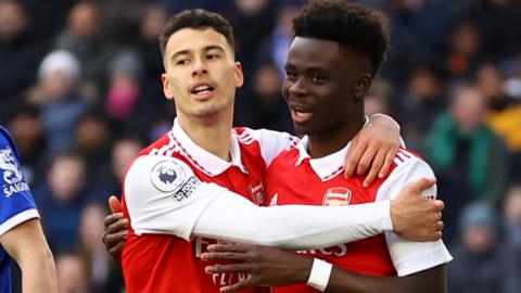 Bukayo Saka and Gabriel celebrate Arsenal's winner at Leicester
