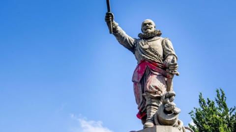 A statue of Dutch Lieutenant and admiral of the West India Company is covered in paint
