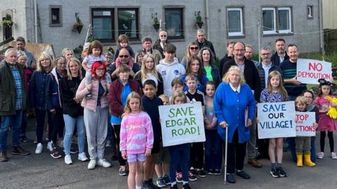 Villagers protesting outside Edgar Road houses in Westruther
