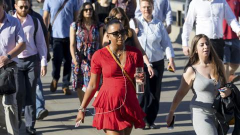 Commuters carrying water on train and underground services