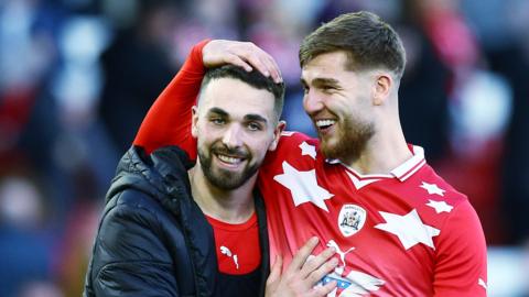 Barnsley players celebrate their win over Derby