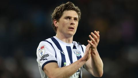 Adam Reach claps the fans after a match for West Brom