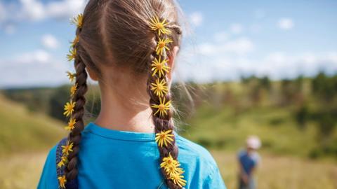 Girl in Ukraine with flowers in her braided hair