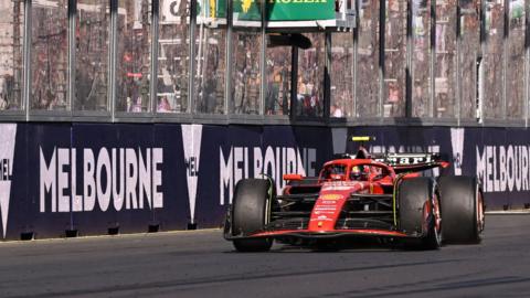 Carlos Sainz racing at the Melbourne Grand Prix in 2024