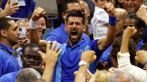 Novak Djokovic celebrates his US Open triumph