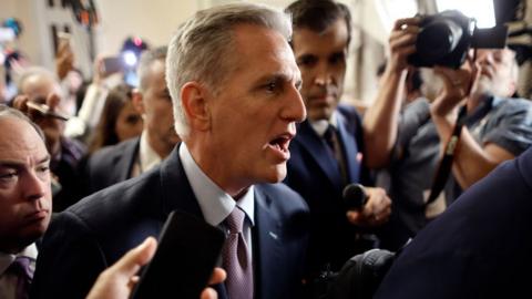 Kevin McCarthy talks to reporters