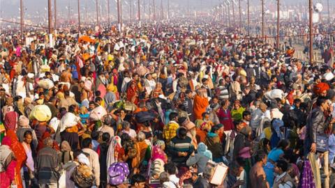 Kumbh Mela Hindu Festival, 2013, Crowds of pilgrims taking holy bath in the Ganges River, Allahabad.