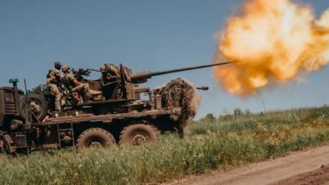 Ukrainian soldiers from the 60th Battalion of Territorial Defense, are shooting rounds into Russian positions with an S60 anti-aircraft canon placed on a truck, outside Bakhmut, Ukraine on June 19, 2023.